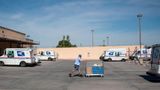 States and environmental groups sue Postal Service over gas-powered trucks