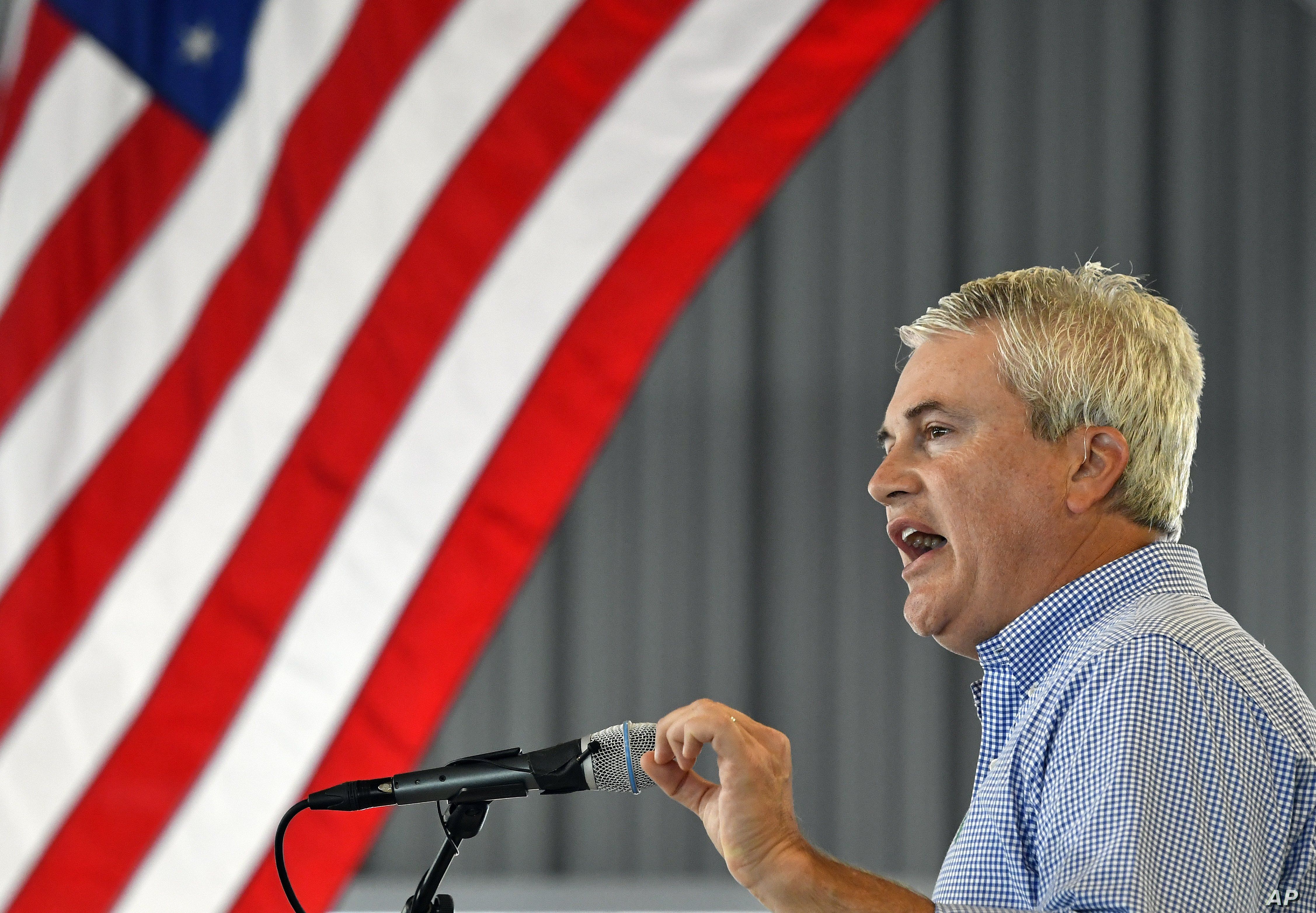 Rep. James Comer, R-Ky., speaks to the audience gathered at the 138th annual Fancy Farm Picnic, Saturday, Aug. 4, 2018, in Fancy Farm, Ky. (AP Photo/Timothy D. Easley)