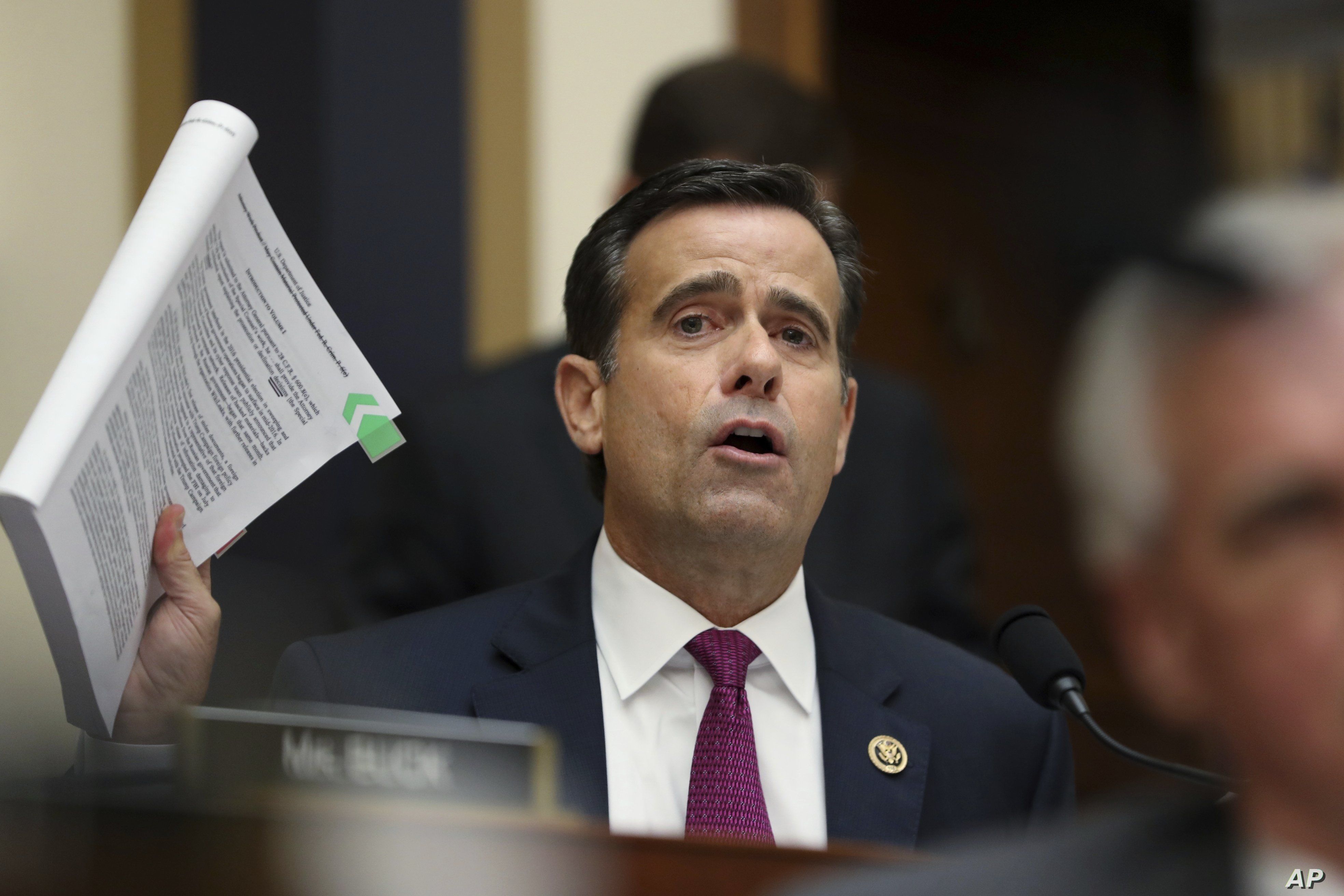 Republican Congressman John Ratcliffe poses questions to former special counsel Robert Mueller, as he testifies before the House Judiciary Committee on his report on Russian election interference, on Capitol Hill, in Washington, July 24, 2019.