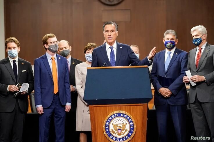 U.S. Senator Mitt Romney (R-UT) speaks as bipartisan members of the Senate and House gather to announce a framework for fresh COVID-19 relief legislation at a news conference on Capitol Hill in Washington, Dec. 1, 2020.