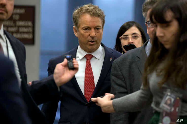Sen. Rand Paul, R-Ky., talks to reporters before attending the impeachment trial of President Donald Trump on charges of abuse…