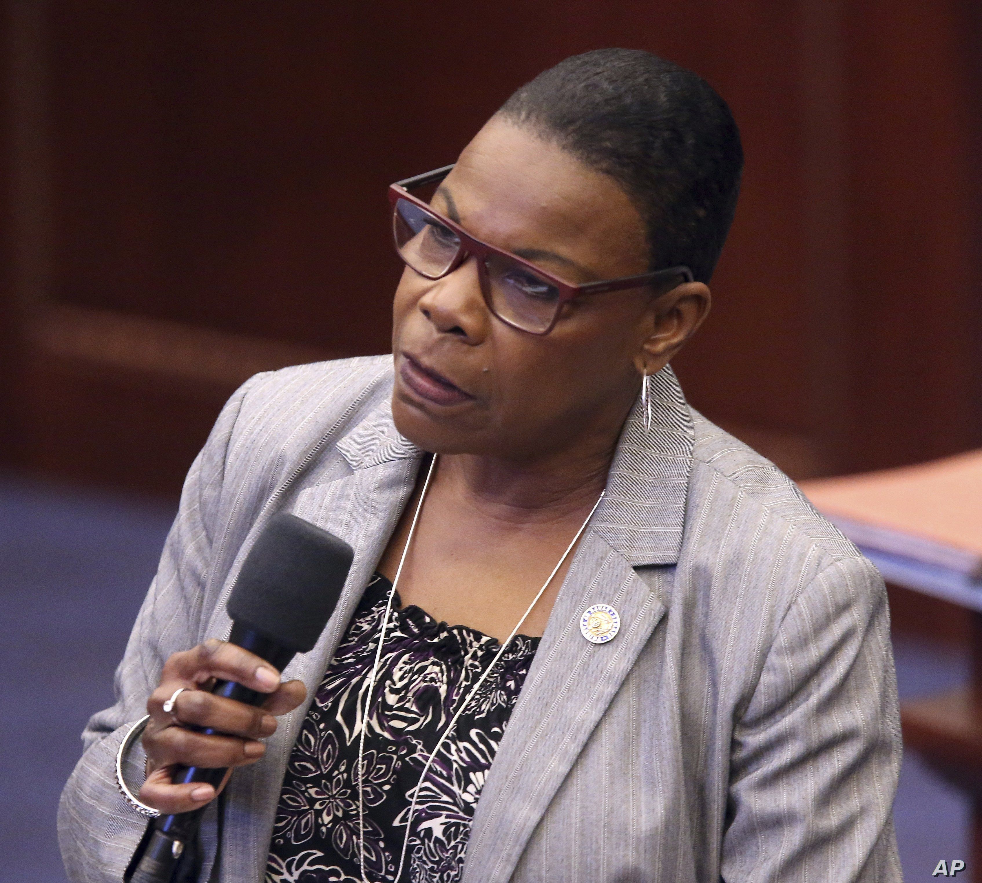 Sen. Audrey Gibson, D-Jacksonville, debates on a bill to allow teachers to be armed during session Wednesday April 17, 2019, in Tallahassee, Fla. (AP Photo/Steve Cannon)