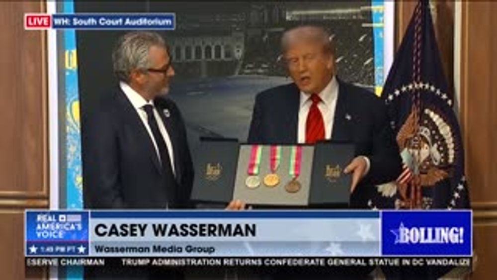CHAIRMAN OF 2028 LA OLYMPICS PRESENTS TRUMP WITH A SET OF MEDALS FROM 1984 OLYMPICS