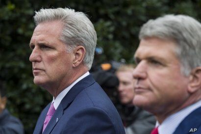 House Minority Leader Kevin McCarthy of Calif., left, and Rep. Michael McCaul, R-Texas, speak with reporters after a meeting…