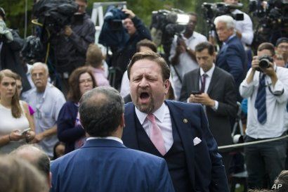 Conservative radio host Sebastian Gorka yells at Playboy reporter Brian Karem after President Donald Trump spoke about the 2020 census in the Rose Garden of the White House, in Washington, July 11, 2019.