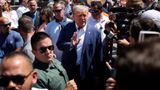 Trump arrives at Fulton County jail to surrender for election charges in Georgia case