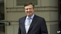 FILE - Paul Manafort, President Donald Trump's former campaign chairman, leaves the Federal District Court in Washington after a hearing, May 23, 2018.