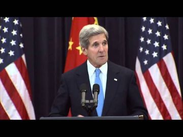 Tearful John Kerry says wife is improving