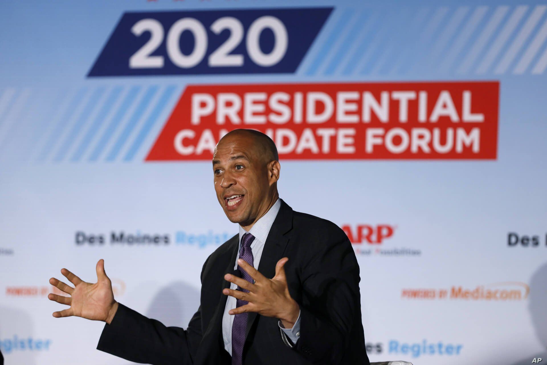 FILE - Democratic presidential candidate Sen. Cory Booker speaks during a presidential candidates forum sponsored by AARP and The Des Moines Register in Des Moines, Iowa, July 15, 2019. 