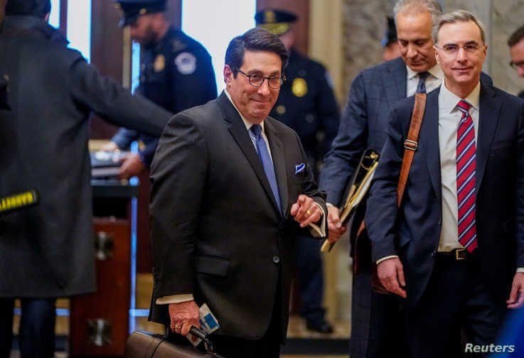 U.S. President Donald Trump's personal attorney Jay Sekulow and White House counsel Pat Cipollone pass through security as they…