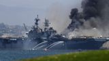 Navy charges sailor with fire that destroyed warship