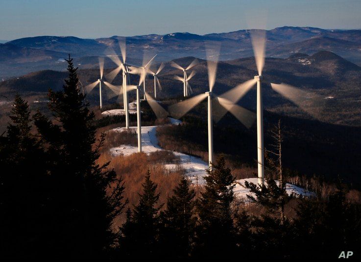  The blades of wind turbines catch the breeze at the Saddleback Ridge wind farm in Carthage, Maine, March 19, 2019.