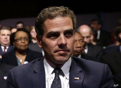 FILE - In this Oct. 11, 2012, file photo, Hunter Biden waits for the start of the his father's, Vice President Joe Biden's,…