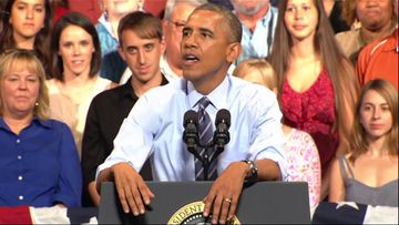Obama responds to hecklers on immigration