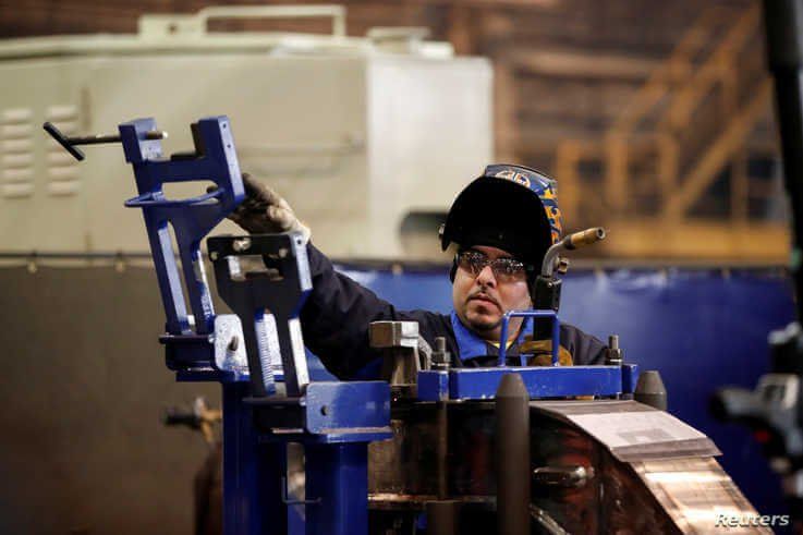 A LB Steel LLC's employee manufactures a component for new Amtrak Acela trains built in partnership with Alstom in Harvey,…