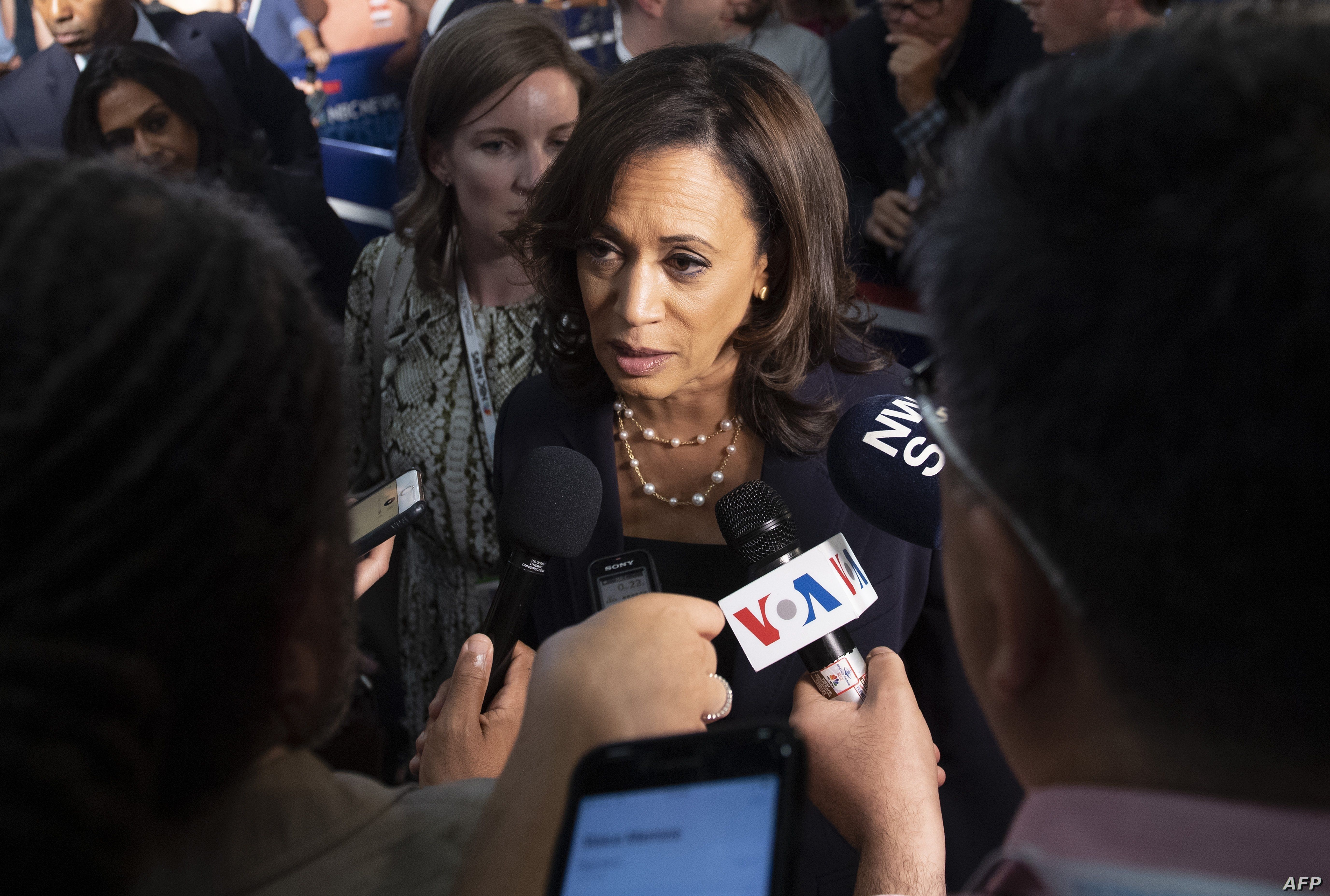 Kamala Harris speaks in the spin room after the first Democratic candidates' debate in Miami.