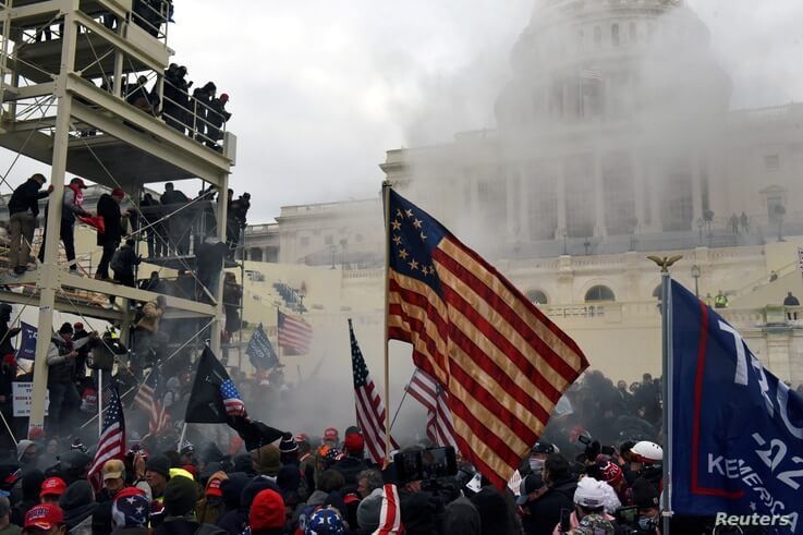 FILE PHOTO: Supporters of U.S. President Donald Trump protest in front of the U.S. Capitol Building in Washington, U.S. January…