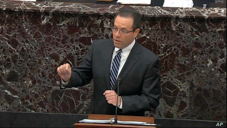 In this image from video, White House deputy counsel Mike Purpura speaks during the impeachment trial of President Donald Trump in the Senate at the Capitol in Washington, Jan. 25, 2020. (U.S. Senate TV/Handout via AP)