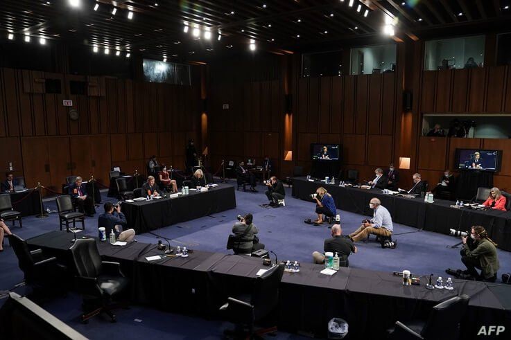 Lawyers Randall D. Noel and Pamela J. Roberts testify during a Senate Judiciary Committee confirmation hearing of President Donald Trump’s Supreme Court nominee Judge Amy Coney Barrett on Capitol Hill in Washington, Oct. 15, 2020.