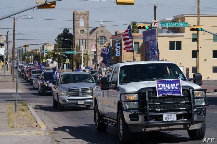 Trump supporters participate in a car parade on October 24, 2020 in El Paso, Texas. (Photo by Paul Ratje / AFP)