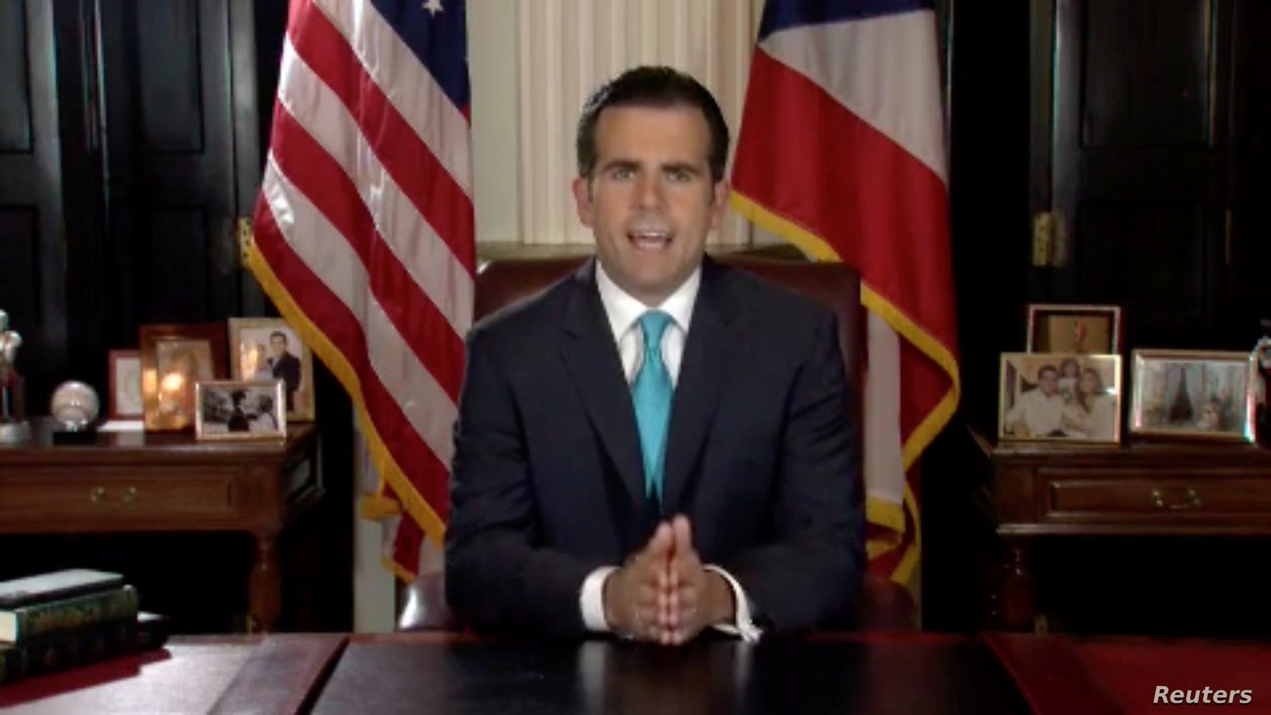 Puerto Rico Governor Ricardo Rossello speaks as he announces his resignation in San Juan, Puerto Rico, early July 25, 2019.