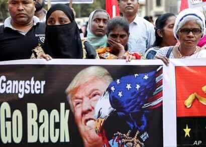 Supporters of the Communist Party of India -Marxist protest against the India visit of US President Donald Trump in Mumbai,…