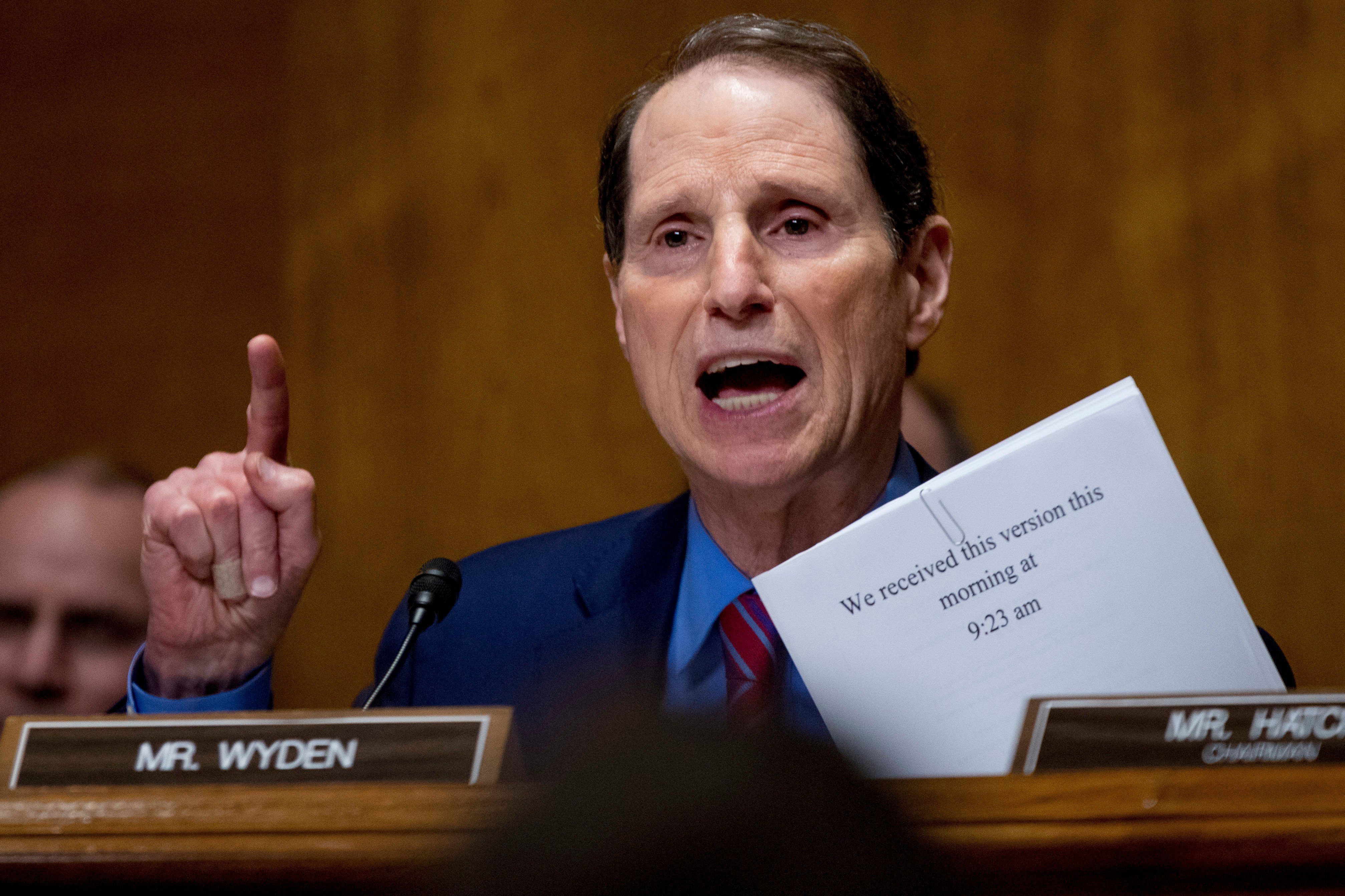 FILE - Sen. Ron Wyden, D-Oregon, speaks on Capitol Hill in Washington, Sept. 25, 2017. Wyden wants to know how well prepared the country’s top voting machine manufacturers are against hackers. 