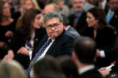 Attorney General William Barr arrives before President Donald Trump speaks in the East Room of the White House about his…