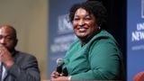 Georgia Democratic governor candidate Abrams criticized for not wearing COVID mask among students