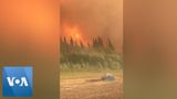 Fire and Smoke Fill Air as Fire Service Battles Alaska Wildfires