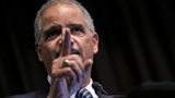 Ex-Attorney General Eric Holder squares off against three Texas Supreme Court justices