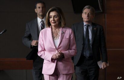 Speaker of the House Nancy Pelosi, D-Calif., joined by Rep. John Sarbanes, D-Md., left, and Rep. Tom Malinowski, D-N.J., leads House Democrats to discuss H.R. 1, The For the People Act, which passed in the House but is being held up in the Senate,…