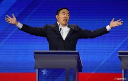 Entrepreneur Andrew Yang reacts at the 2020 Democratic U.S. presidential debate in Houston, Sept. 12, 2019. 