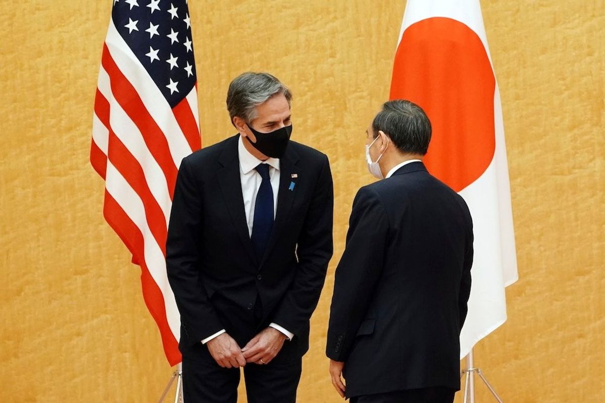 Japan’s Suga Faces Tough Balancing Act Between US, China