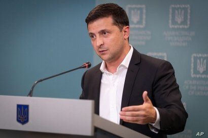 Ukrainian President Volodymyr Zelenskiy speaks to media during his press conference in Kyiv, Ukraine, Oct. 1, 2019. 