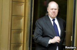 FILE - Lawyer John Dowd exits Manhattan Federal Court in New York, May 11, 2011.