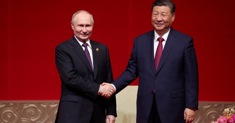 Putin signs military cooperation statement with Xi during meeting in Beijing