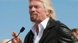 Branson soars toward space aboard own winged craft, launching new era of civilian exploration