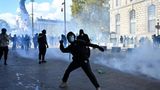 Protestors in French cities clash with police, break windows, block roads