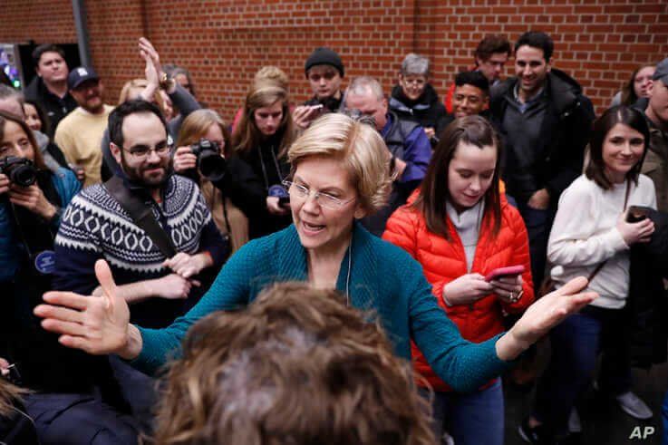 Democratic presidential candidate Sen. Elizabeth Warren, D-Mass., speaks at a caucus at Roosevelt Hight School, Monday, Feb. 3,…