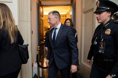 Ambassador Kurt Volker, former special envoy to Ukraine, leaves the hearing room as they conclude a public impeachment hearing…