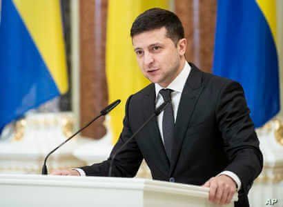 Ukrainian President Volodymyr Zelenskiy speaks in Kyiv, Dec. 4, 2019.