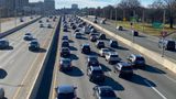 Two dead and 20 injured when Coach bus flips over on the Long Island Expressway