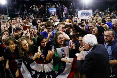 Democratic presidential candidate Sen. Bernie Sanders, I-Vt., meets with attendees campaign event, Thursday, Feb. 27, 2020, in…