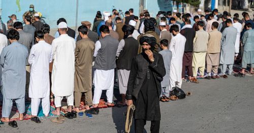 At least 14 killed in Kabul mosque and Islamic State bombings in Afghanistan