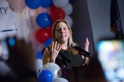 Congressional candidate Liuba Grechen Shirley delivers a concession speech during the Nassau County Democratic Committee…