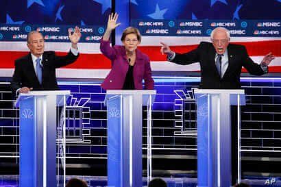 From left, Democratic presidential candidates, former New York City Mayor Mike Bloomberg, Sen. Elizabeth Warren, D-Mass., Sen…