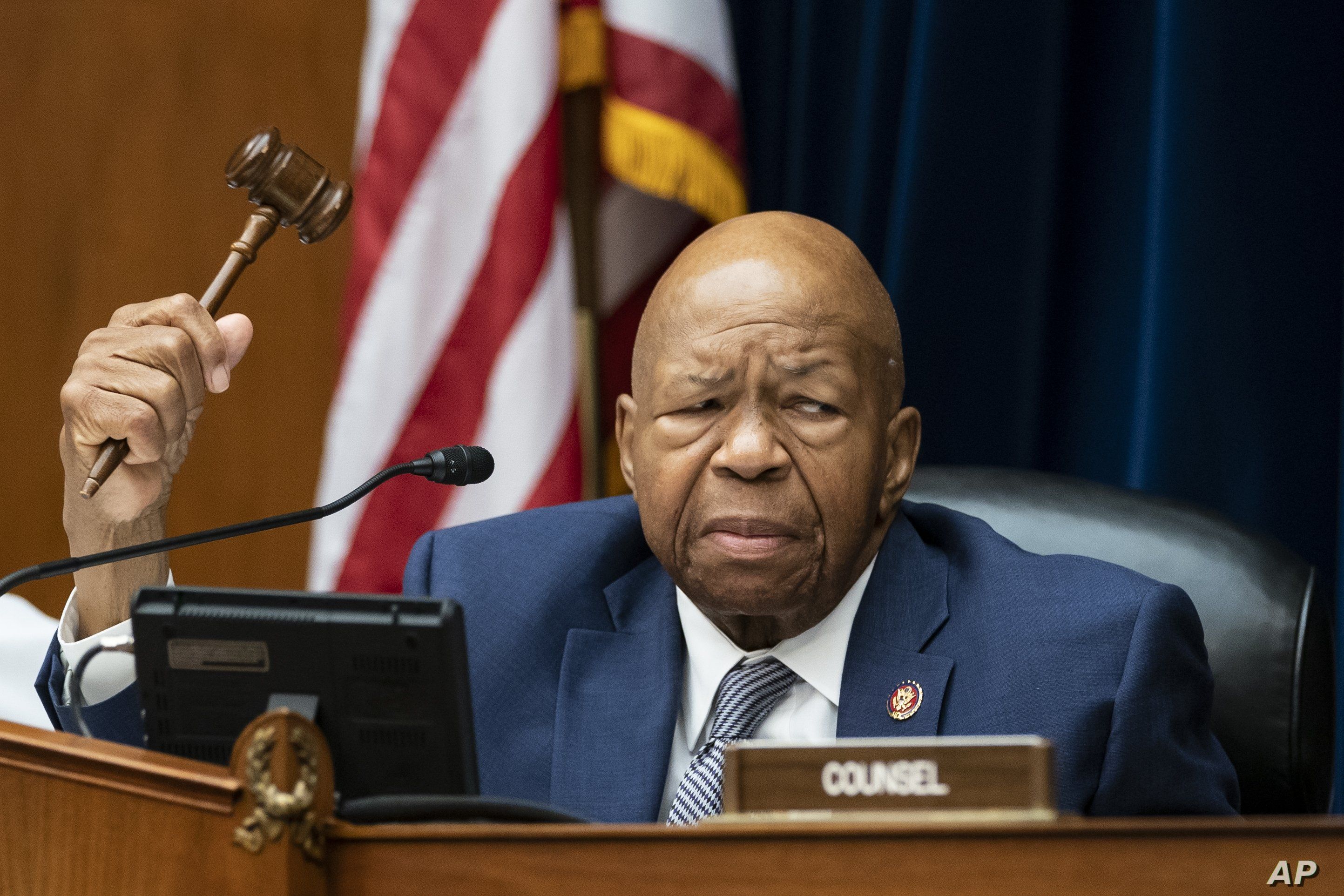 House Oversight and Reform Committee Chairman Elijah E. Cummings, D-Md., considers whether to hold Attorney General William Barr and Commerce Sec. Wilbur Ross in contempt, on Capitol Hill in Washington, June 12, 2019.