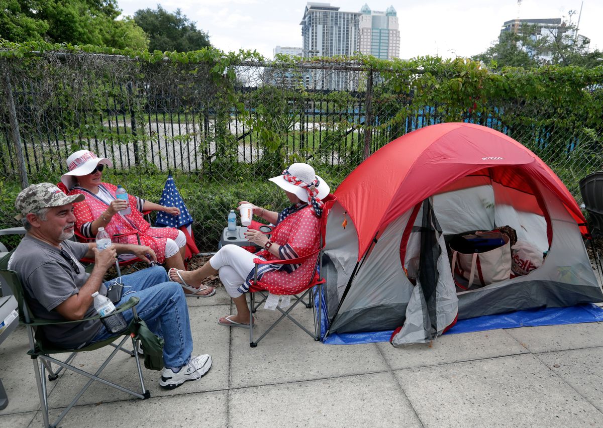 Fans, Protesters Line Up for Trump’s Re-election Rally