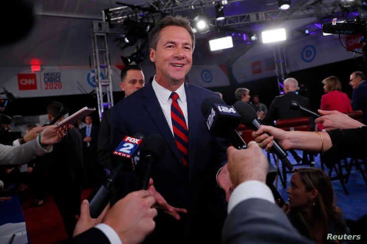 Democratic 2020 U.S. presidential candidate Montana Governor Steve Bullock talks to the media after the first night of the second 2020 Democratic U.S. presidential debate in Detroit, Michigan, July 30, 2019.